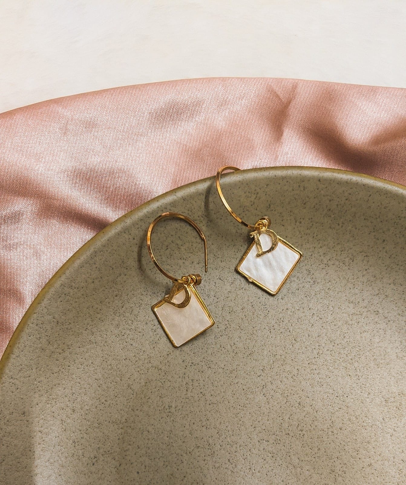 Dior logo and shell worked earring